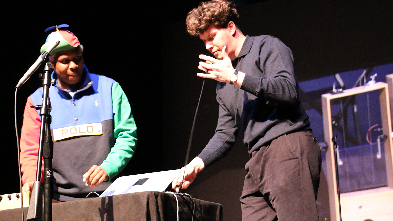 Stretchi creator Hugh Aynsley demonstrates his instrument on stage with collaborator Shannon Ladson.